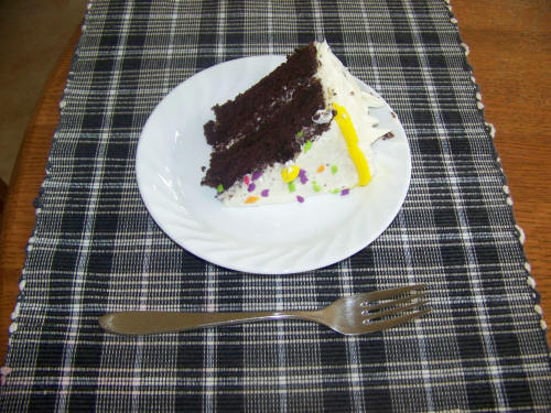 photo of a large slice of chocolate cake